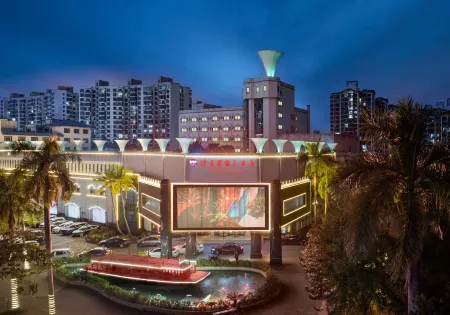 Qionghai waika Hotel (Wanquanhe store) Отели в г. Цюнхай