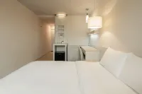 Kindness Hotel - Houyi Jiuru Hotell i Dashu District