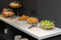 REZEN LONGUU Hotel (Sanmingbei High-Speed Railway Station Shaxian Airport) - sarapan