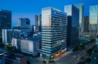 Vienna International Hotel (Shenzhen Baolong Metro Station) Hôtels à : Nouveau quartier de Pingshan