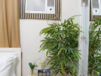 Condo at Quezon City MCHD staycation Trees Residences 錦繡城市購物中心附近的飯店