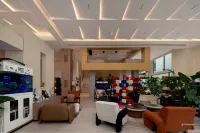 Lansheng Hotel (Xing Yi Jushan Square Mengle City Branch)