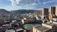 Xinghe Qixin Hotel (Minzhou Nightless City) - Dağ Manzaralı