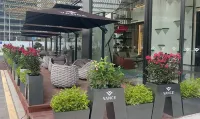 萬斯飯店（火車東站機場路店） - 5 星級