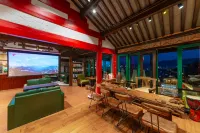 Lijiang YueTing Aerial Scenery Terrace Hotel - بار