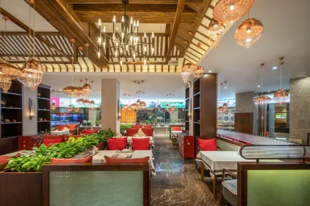 Mango One Huayue Hotel Отели рядом с достопримечательностью «Zhang Zhongjing Memorial Temple»