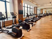 โรงแรมสไตล์บูทีคอี้เหอชุน (สถานีรถไฟความเร็วสูงอี้เหอใต้ โซนพัฒนาเทคโนโลยีขั้นสูง)