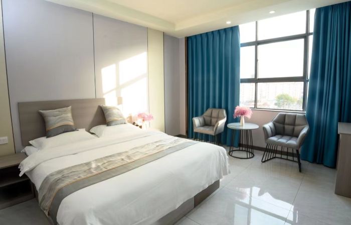 Pinxin Business Hotel (Gushi Experimental Middle School Chenyuanguang Plaza)