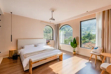 in the spring breeze Отели рядом с достопримечательностью «Xiangnan Botanical Garden»