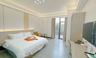 Qushua Ba Hotel (Ba'nan Babin Road Wetland Park Subway Station)