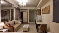 Roland Elegant Residence Homestay (Hohhot East Railway Station Guoneng Building) - Mountain View