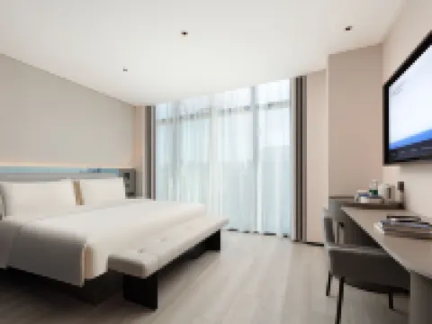 Cixi Sports Center Xinhefang Light Residence Hotel Hoteles en Cixi