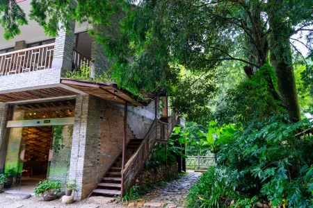 Shan She hotel Отели рядом с достопримечательностью «Ruoliao Yuanshilin»