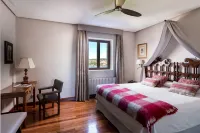 宏達瑞比亞旅館 Pescadería La Marea附近的飯店