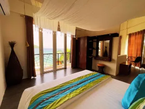 Sunset at Aninuan Beach Resort powered by Cocotel