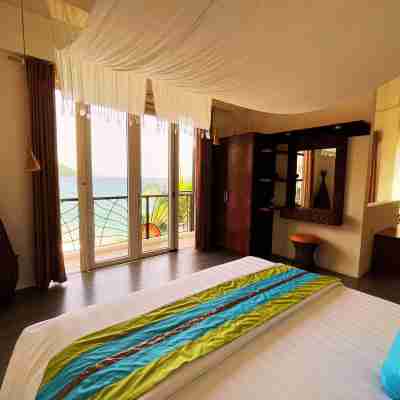 由Cocotel運營的阿尼努安海灘度假村日落 Rooms