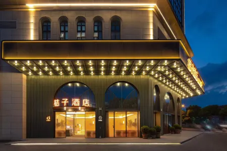 Orange Hotel (Baoying Peiyou International Baitian North Road) Отели в г. Баоин