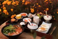 โฮมสเตย์ผู่ซูจิงจิง ทะเลสาบลู่กู