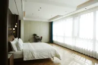 Four Seasons Nabo Hotel Hotels in Duolun