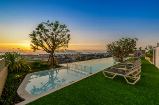 โฮม่าฉลองเบย์ โรงแรมใกล้ฉลองเพียร์มีตติ้งพอยท์