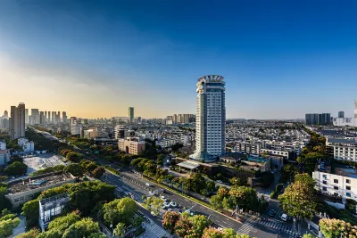 Jinling Aster Hotel Suzhou Отели рядом с достопримечательностью «Сучжоу Технический Университет (Тяньпинский Калифорнийский округ)»