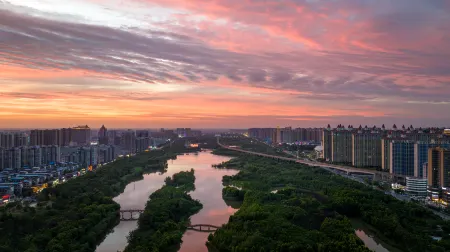 HOMK International Hotel Отели в г. Сяоган