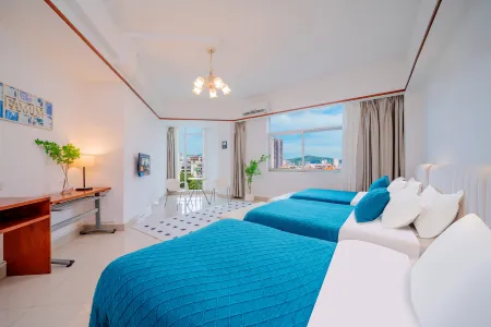 Zhonghui Fashion Hotel Maoming Отели рядом с достопримечательностью «Xiaodongjiang»