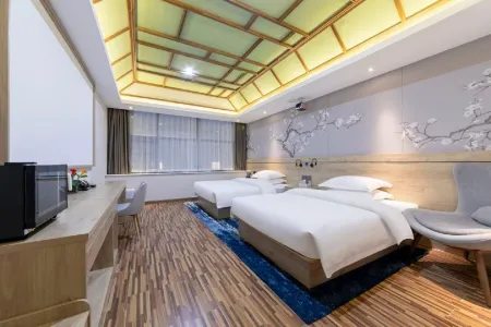 Shangya Audio-visual Apartment (Nanyang Chezhannan Road Railway Station) Отели рядом с достопримечательностью «Nanyang Normal University»