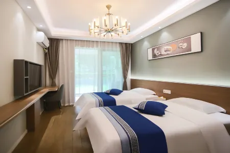 Emeishan Ximan Light and Elegant Resort Hotel Отели рядом с достопримечательностью «Yingbin Square»
