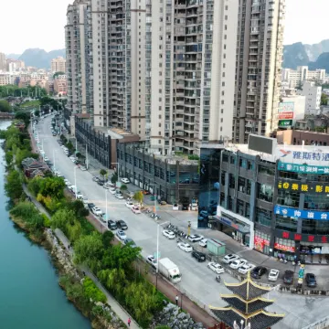 Yeste Hotel (Du'an High - speed Railway Station Binjiang Zhuangyuan Food Street Branch)