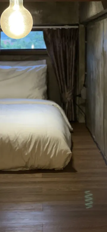 ห้องพักสามเตียงสไตล์ลอฟต์เธียเตอร์