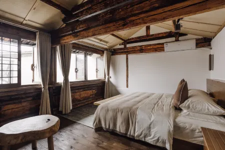 Shipingpingyuan Old Residence Homestay Отели рядом с достопримечательностью «Shiping Yilonghu National Wetland Park»