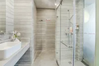 Guangzhou Jiulong Hotel (Meitan Fuyuan Building) Hotels in Meitan