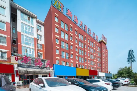 Zhengzhou Xinhaitian Business Hotel (Henan Engineering College Branch) Отели рядом с достопримечательностью «College of Information & Business， Zhongyuan University of Technology»