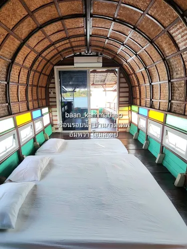 รูปภาพของเรือนรอยน้ำ บ้านกามเทพ อัมพวา โฮมสเตย์