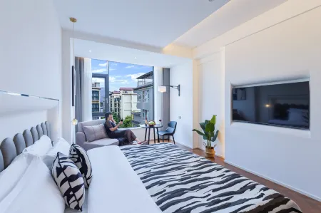 Qiduo Light Luxury Homestay Отели рядом с достопримечательностью «Jianchuan Old Town»