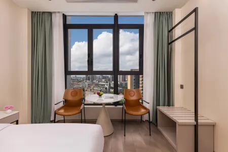 MEHOOD LESTIE Hotel (Guangzhou Panyu Shiqiao Subway Station) Отели рядом с достопримечательностью «Chenyong Park»