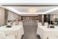 Zhuge Liang Business Grand Hotel (Yinan Lishan Road)