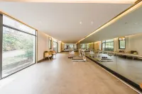 Songfengju Courtyard Hotel (Xingyi Wanfenglin Airport & High-speed Railway Station Branch)
