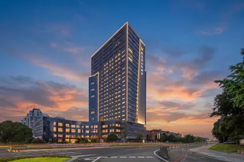 Vienna International Hotel (Ningbo Xiangshan Wanda Plaza Branch) - موقف سيارات