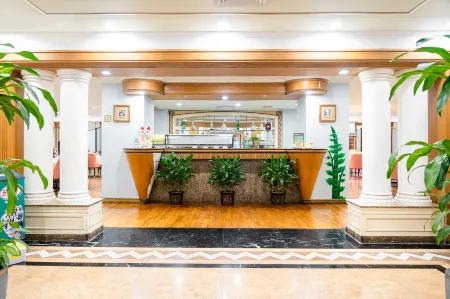 NOBLE BADGE HOTEL Отели рядом с достопримечательностью «Hejiang Attic»