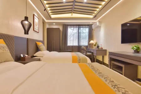 Liuqing Guest House Hotel (Kaifeng Qingming Shangheyuan Store) Отели рядом с достопримечательностью «Huangsong Daguan Xingkong Keji Art Museum»