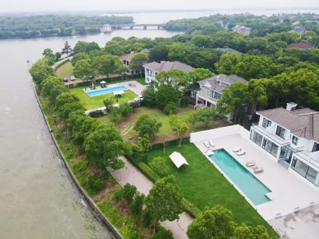 Dianshan Lake Jiuyue Shiguang · Lakeside Swimming Pool Party Resort Villa Отели рядом с достопримечательностью «Xiangban Jijiadun»