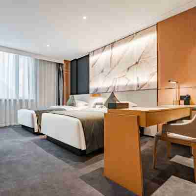 嵊州柏星麗呈酒店(東前街越秀路店) Rooms