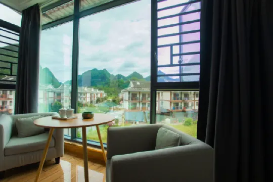 Libo Xiaoqikong Xinjiayuan Inn