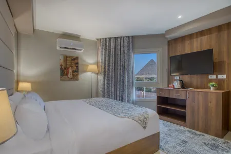 Nozol Pyramids Hotel Отели в г. Kafr Nassar