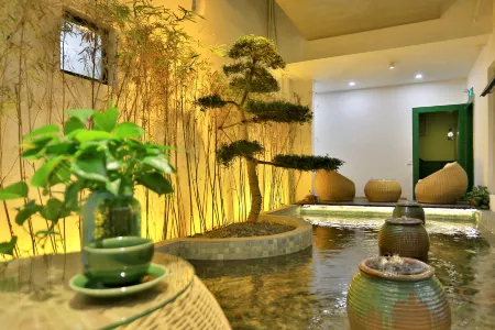 Wuzhen Yuyin Courtyard Design Hotel (South Gate of Xizha Scenic Area) Отели рядом с достопримечательностью «Fu'an Bridge»