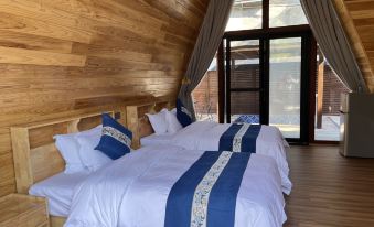 Jiuhe Yunshan Quanju Hot Spring Wooden House B&B