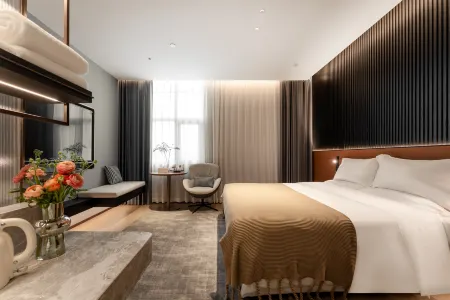 Hua Rong Yue Hotel (Chang 'an University Town Plaza South Road Hotel) Отели рядом с достопримечательностью «Qingliangshan Forest Park»