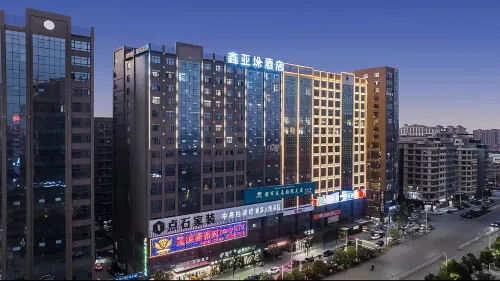 Xinyaxuan Hotel (Yudong High-speed Railway Station) فنادق في شاودونغ
